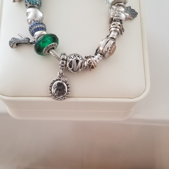 Authentic Pandora full of charms bracelet! - Picture 5 of 14